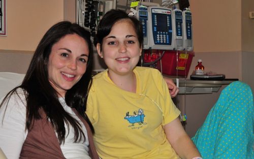 Patient Lindsey smiling with sister
