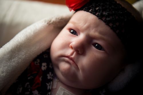 As part of normal physical development, your child may be able to hold her head up and begin to push up when lying on her tummy.