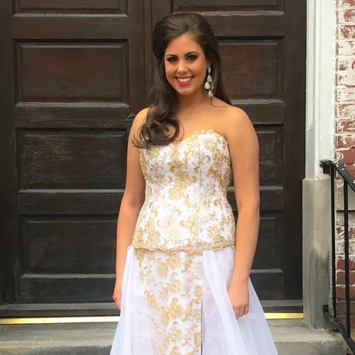 A female cancer patient in a dress before prom.