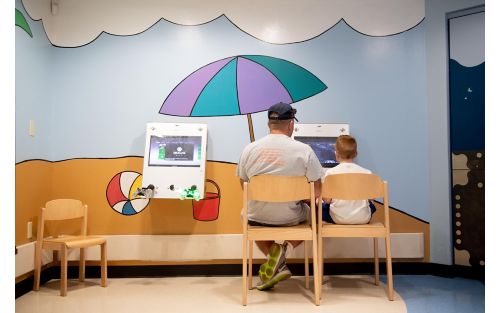 Father and son at pediatric center 