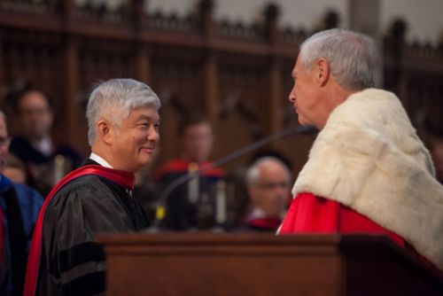 Ching-Hon Pui, MD, shaking hands with John Malcolm McCardell Jr.,