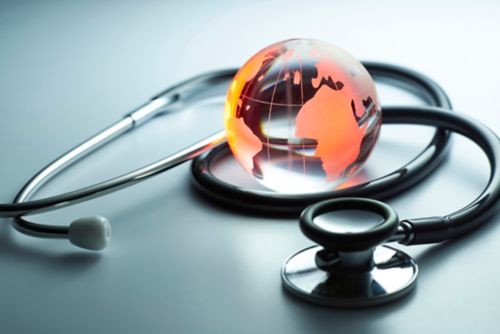 Small globe with stethoscope