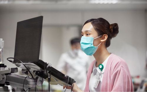 Nurse working at computer