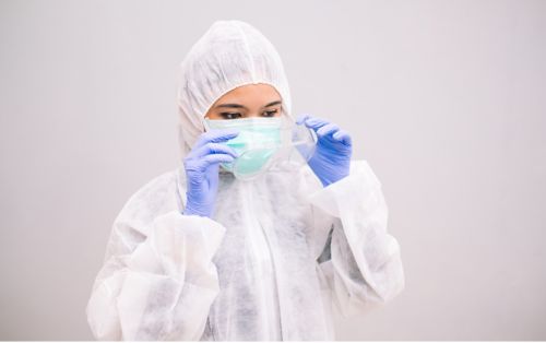 Female healthcare worker in PPE
