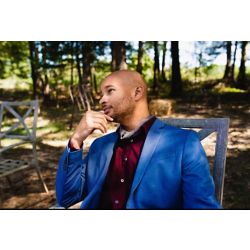 Ricky Terry sitting in chair outdoors