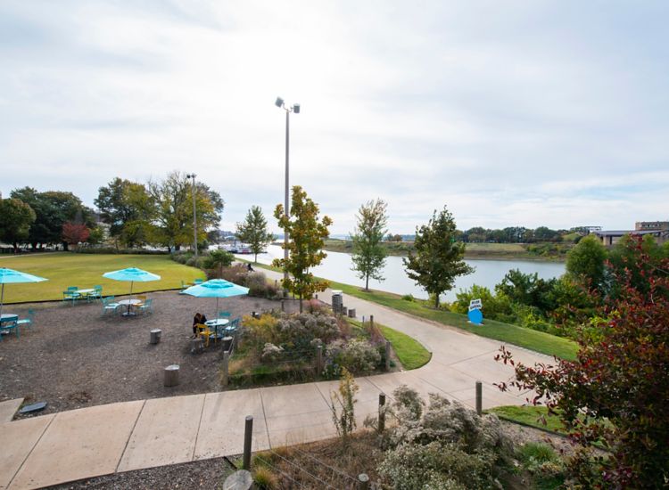 River Garden Park with dining tables, walking paths and a river view in Memphis