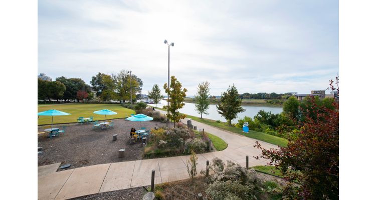 River Garden Park with dining tables, walking paths and a river view in Memphis