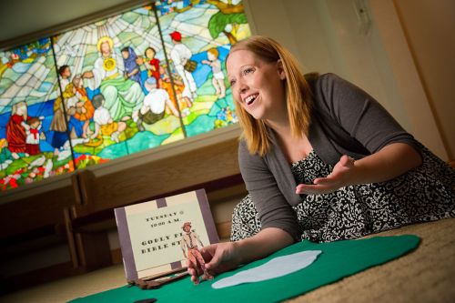 Chaplain at a pediatric cancer hospital prepares for play-based activity.