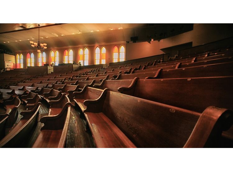 Wooden pews in the Ryman Auditorium, the Mother Church of Country Music in Nashville Tennessee