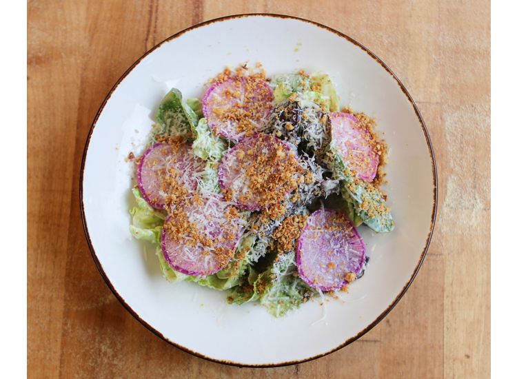 Endive and radish salad with bread crumbs, cheese and salad dressing at Catherine & Mary's Restaurant in Memphis