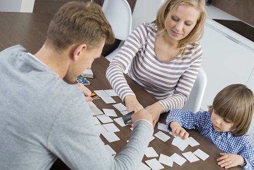 A family playing a card game