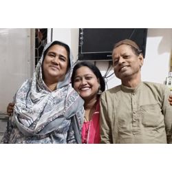 Sitara with her parents