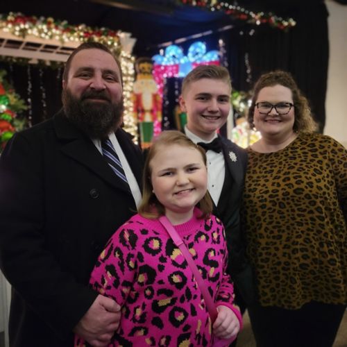 family dressed up for dance