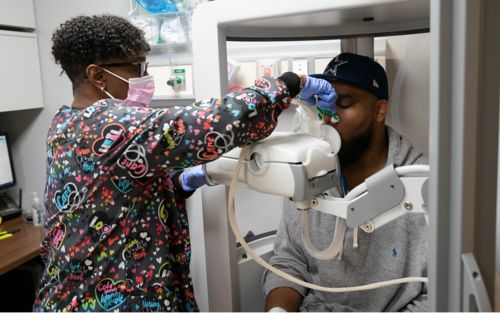 A patient receiving a functional assessment