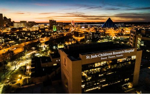 St. Jude hospital with Memphis skyline, at night