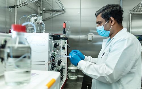 photo of man in lab