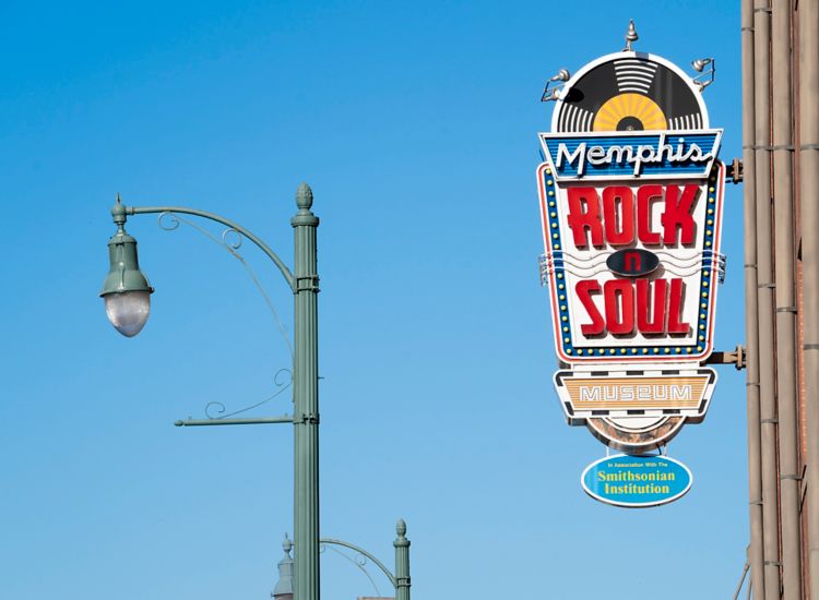 Memphis Rock N Soul Museum sign with blue sky.