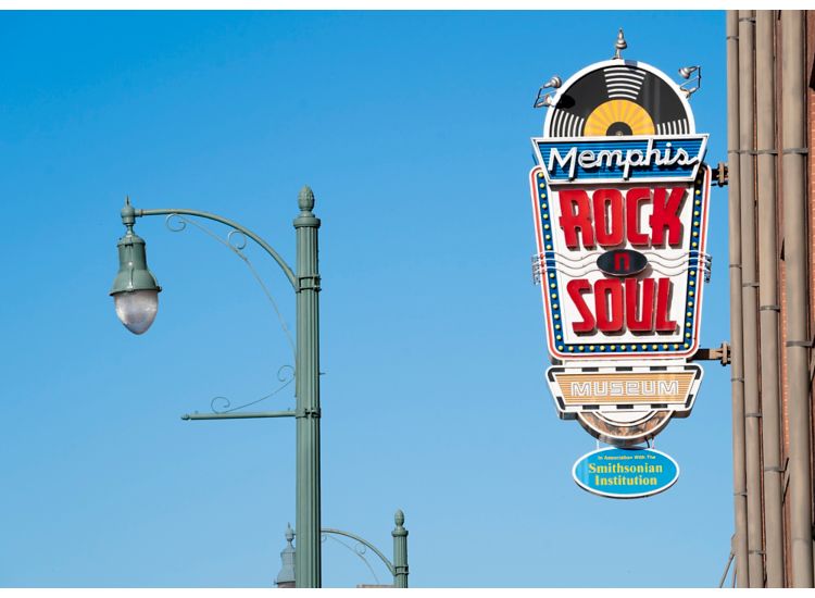 Memphis Rock N Soul Museum sign with blue sky.