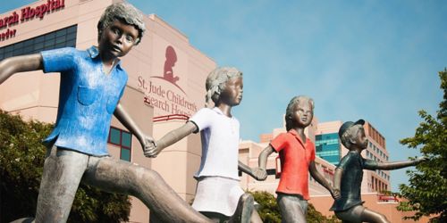 image of sculpture of running children 