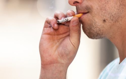 image of person smoking tobacco