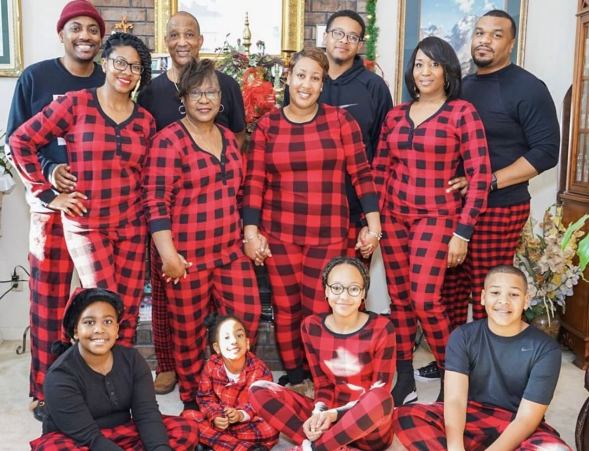 family in matching holiday pajamas