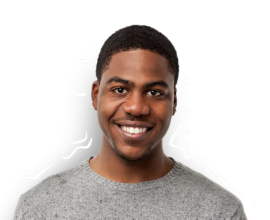 A teenager facing forward and smiling