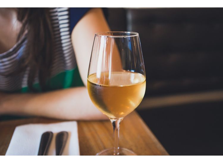 image of wine glass at a table