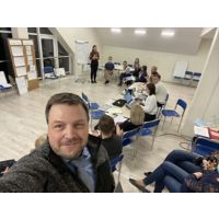 Marcin Wlodarski at Unicorn Clinic staff meeting