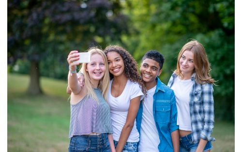 teens taking a selfie