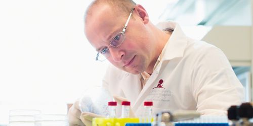 Photo of Ben Youngblood, PhD, in his lab