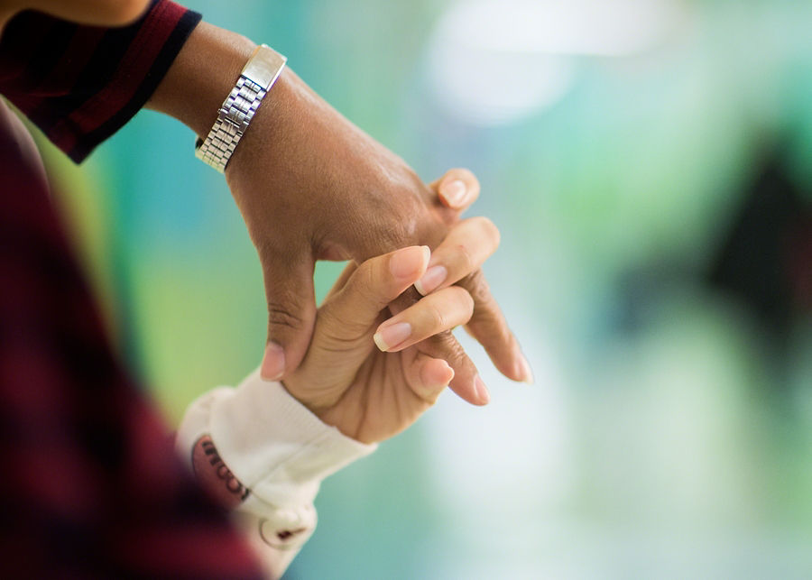 Hands holding