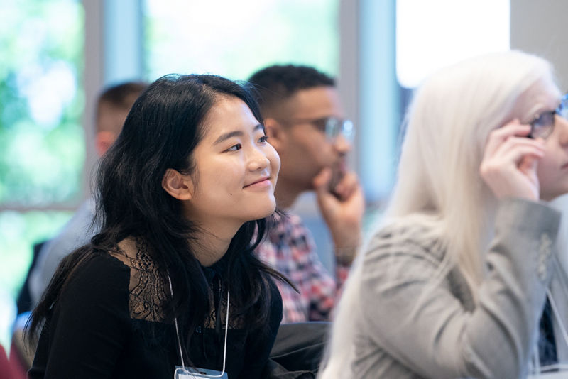 Holly Huang (UCLA) enjoying the keynote lecture.