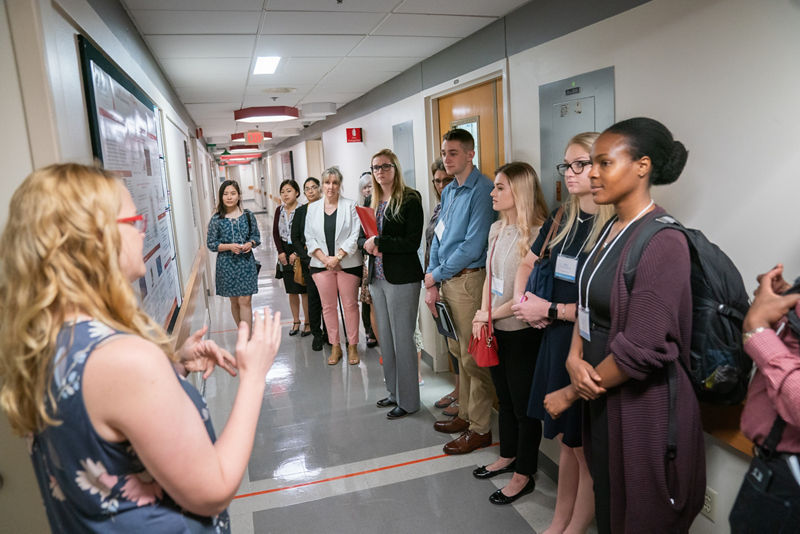 Participants touring the Center for Advanced Genome Engineering facility.