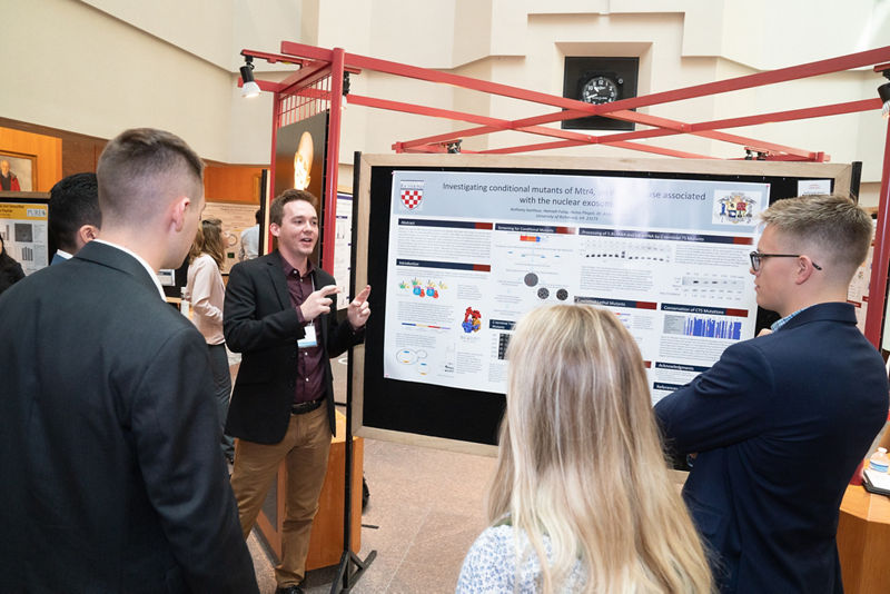 Anthony Isenhour (University of Richmond) giving his poster presentation.