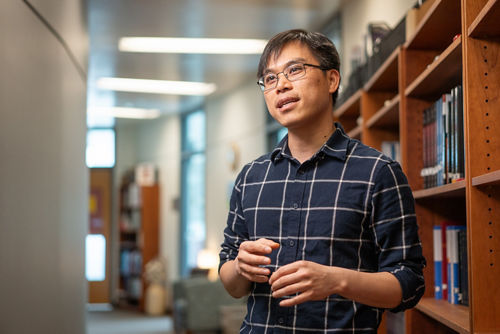 Photo of Hai T. Dao smiling in his office