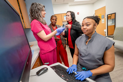 Nurses working with prepared doses of medication