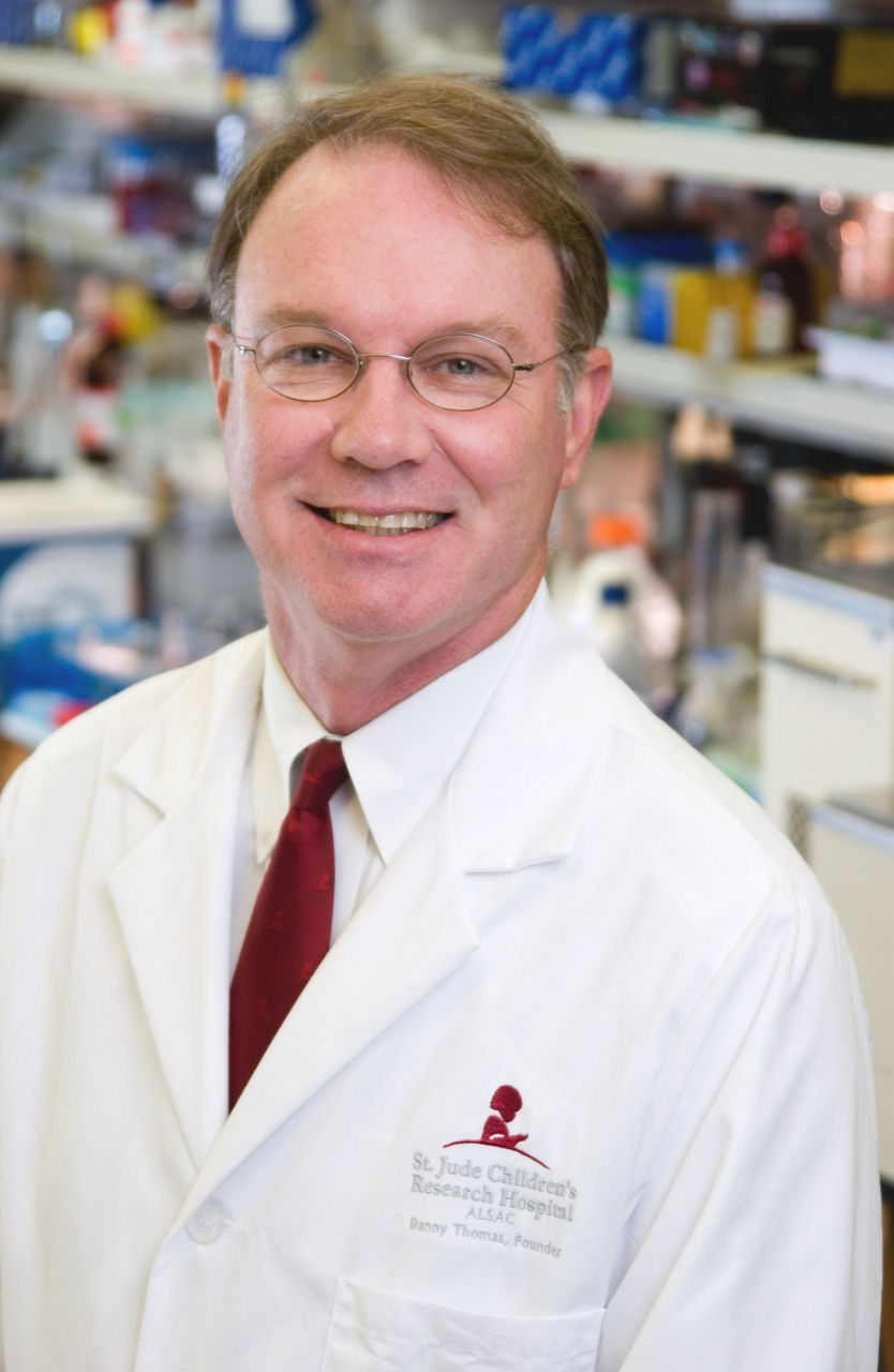 Photo of Dr. William Evans in white coat