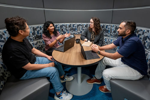 group of people sitting at a table