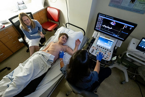 Deena Levine and son Elisha Davidovics, who is getting a test in the hospital