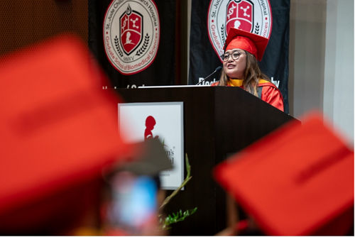 A global scholar addressing in a ceremony