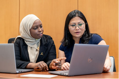 Global scholars collaborating. 