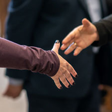 two people shaking hands