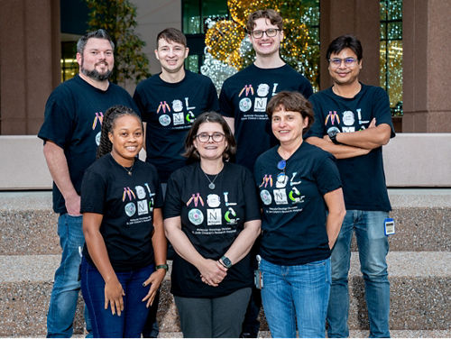 Members of the Guenther lab wearing matching t-shirts. 