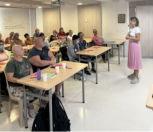 Isabella giving presentation in classroom
