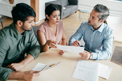 Couple meeting with financial advisor