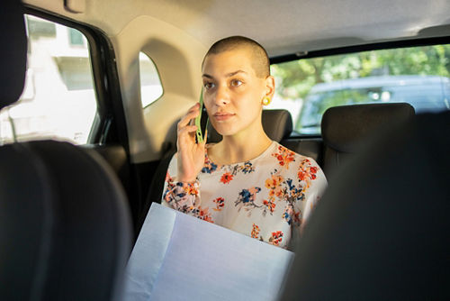 Woman on phone in car
