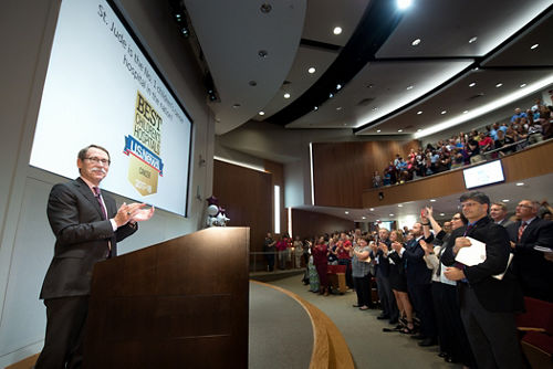 Photo of Dr. James R. Downing speaking to employees