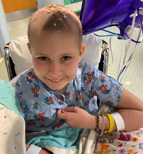 Madi in hospital after ending treatment