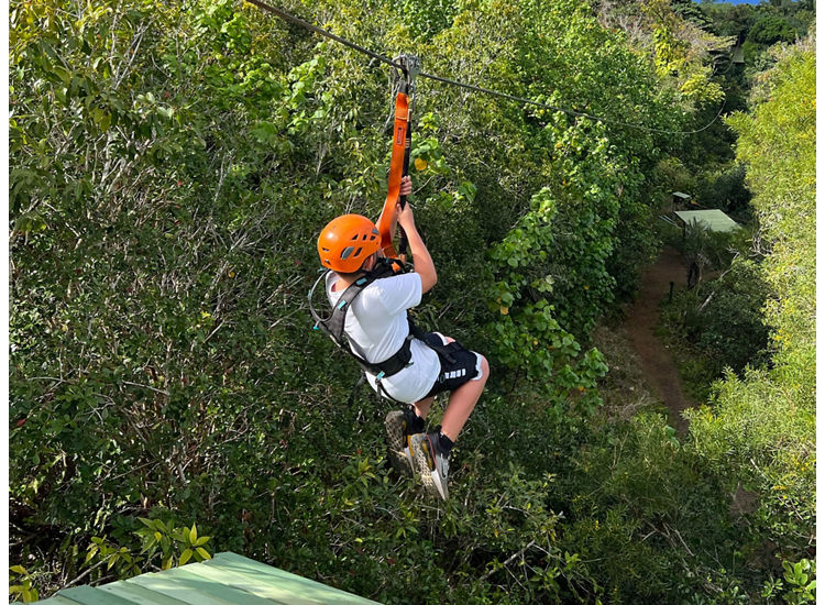 Photo of person ziplining