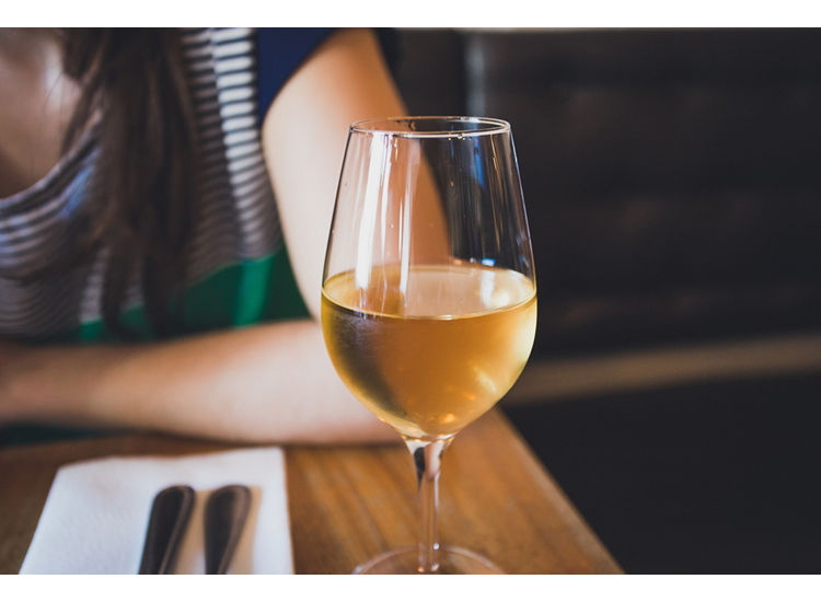 image of wine glass at a table